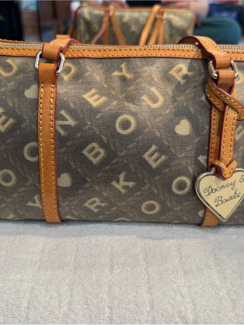 Dooney & Bourke Brown Logo Duffel with Tan Leather Trim